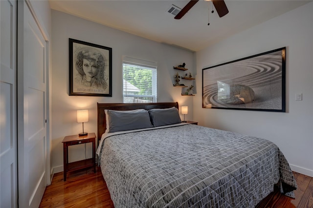 704 Burleson St, Brenham, TX 77833 - bedroom featuring wood finished floors and a ceiling fan