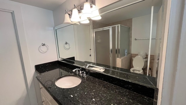 4701 Avenue N 1/2 Ave N 1/2, Galveston, TX 77551 - bathroom with a stall shower, vanity, toilet, and an inviting chandelier
