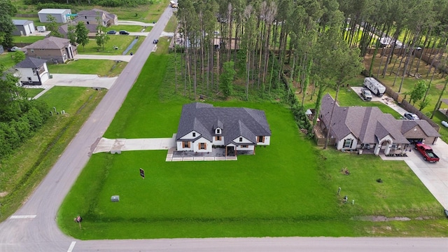 679 Rd 66111, Dayton, TX 77535 - drone / aerial view with a residential view