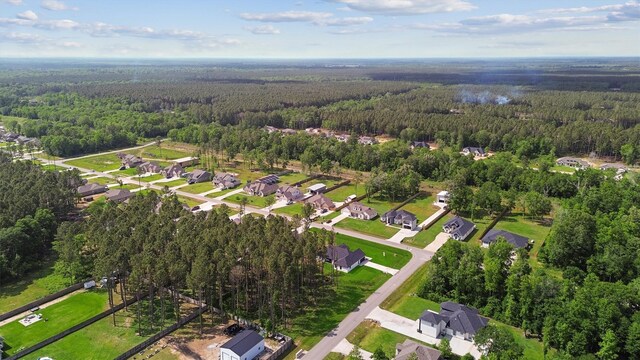 679 Rd 66111, Dayton, TX 77535 - bird's eye view featuring a forest view