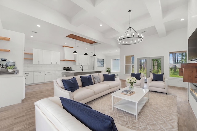 679 Rd 66111, Dayton, TX 77535 - living area featuring light wood-type flooring, recessed lighting, and coffered ceiling