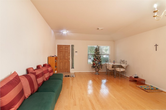 living room with wood finished floors and baseboards