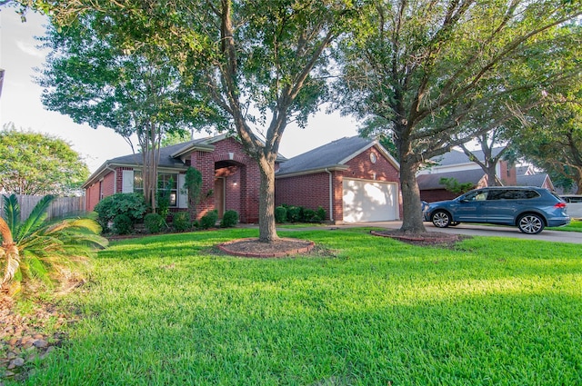 single story home with brick siding, driveway, fence, and a front yard