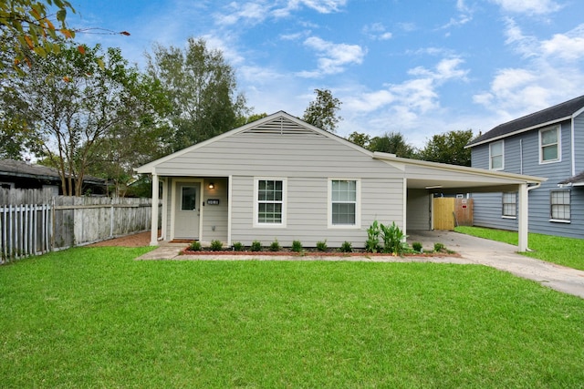 5410 Bataan Rd, Houston, TX 77033 - view of front of house featuring driveway and a carport