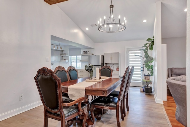 3202 Crossman St, Porter, TX 77365 - dining space featuring a chandelier, light wood-style floors, vaulted ceiling, baseboards, and recessed lighting