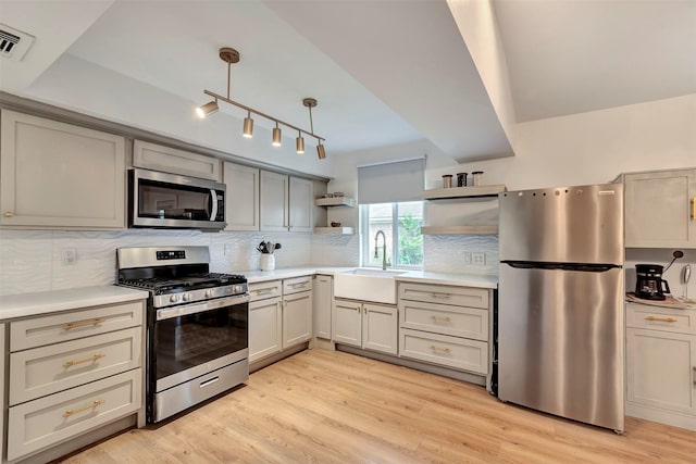 3202 Crossman St, Porter, TX 77365 - kitchen with stainless steel appliances, open shelves, a sink, light countertops, and decorative backsplash