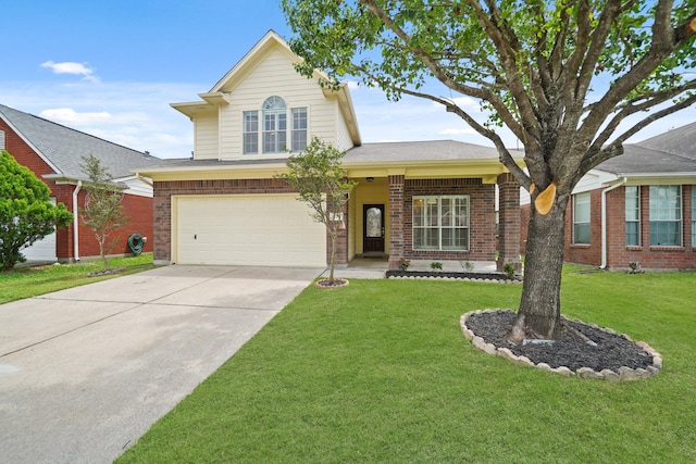 traditional home featuring driveway, brick siding, an attached garage, and a front yard