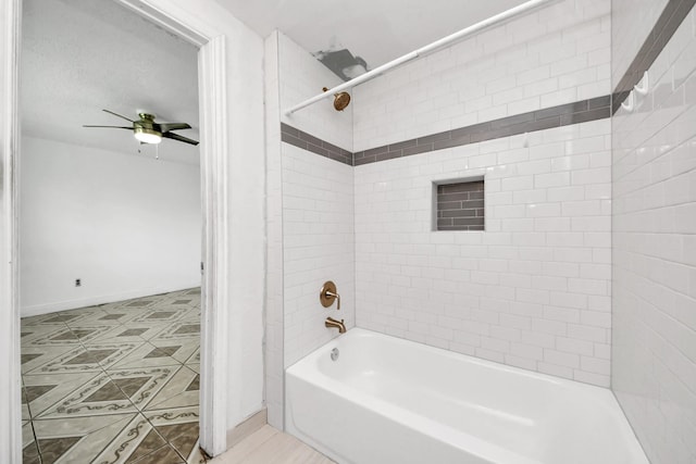 bathroom featuring shower / bathtub combination, a ceiling fan, baseboards, and tile patterned floors