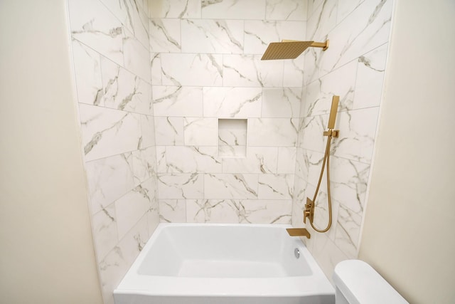 bathroom with toilet and shower / tub combination