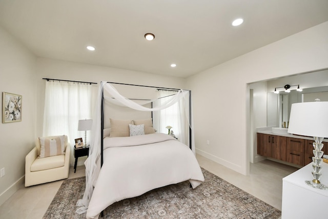 bedroom featuring baseboards and recessed lighting