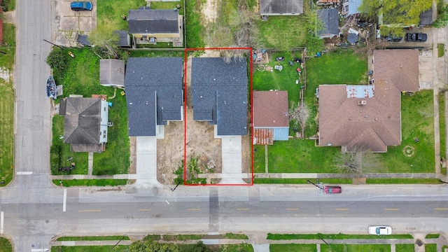 aerial perspective of suburban area with property parcel outlined