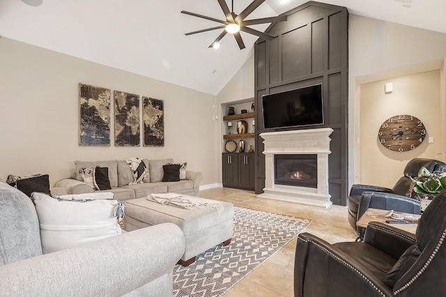 living area with light tile patterned flooring, high vaulted ceiling, built in shelves, ceiling fan, and a large fireplace