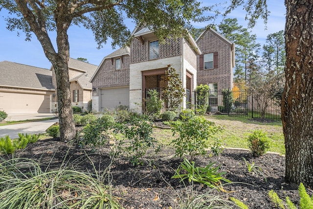 view of front facade featuring brick siding and fence