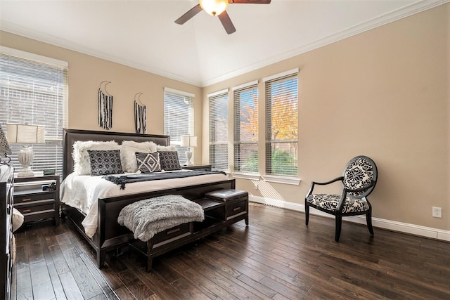 bedroom with multiple windows, vaulted ceiling, baseboards, and dark wood-style floors