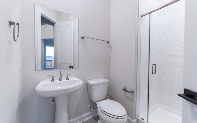 21215 Brook Tide Ln, Cypress, TX 77433 - full bathroom with toilet, a shower stall, and a sink