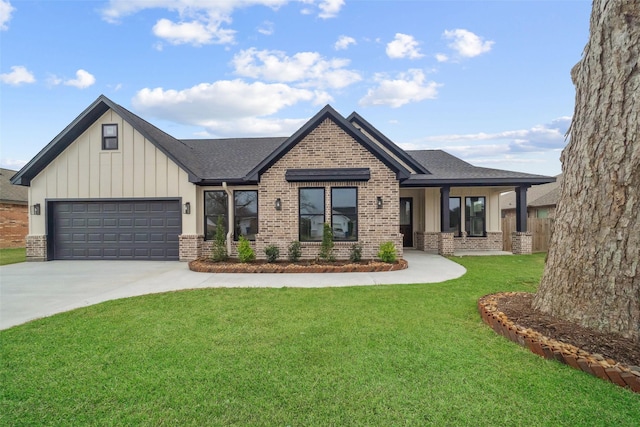 443 Wellshire Dr, West Columbia, TX 77486 - view of front facade with concrete driveway, a front yard, brick siding, and board and batten siding