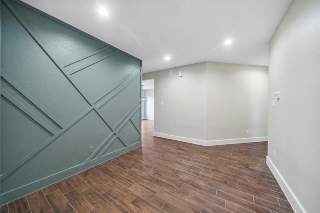 443 Wellshire Dr, West Columbia, TX 77486 - spare room featuring baseboards, dark wood finished floors, and recessed lighting