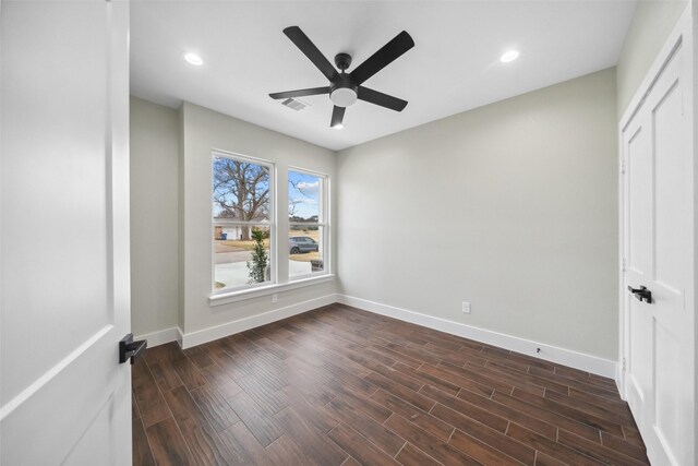 443 Wellshire Dr, West Columbia, TX 77486 - unfurnished bedroom featuring a ceiling fan, dark wood finished floors, visible vents, baseboards, and recessed lighting