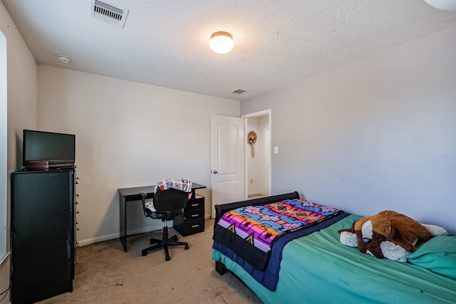 bedroom featuring carpet floors and visible vents