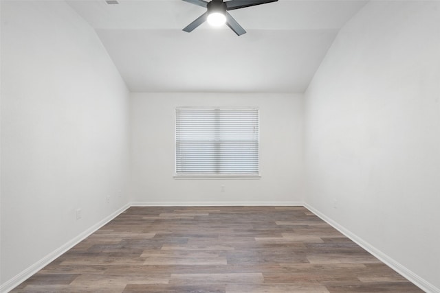 unfurnished room featuring lofted ceiling, ceiling fan, and wood finished floors