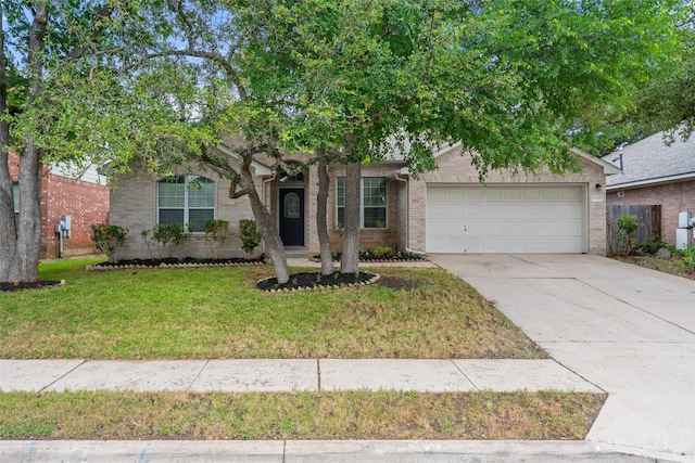 obstructed view of property with concrete driveway, an attached garage, a front lawn, and brick siding