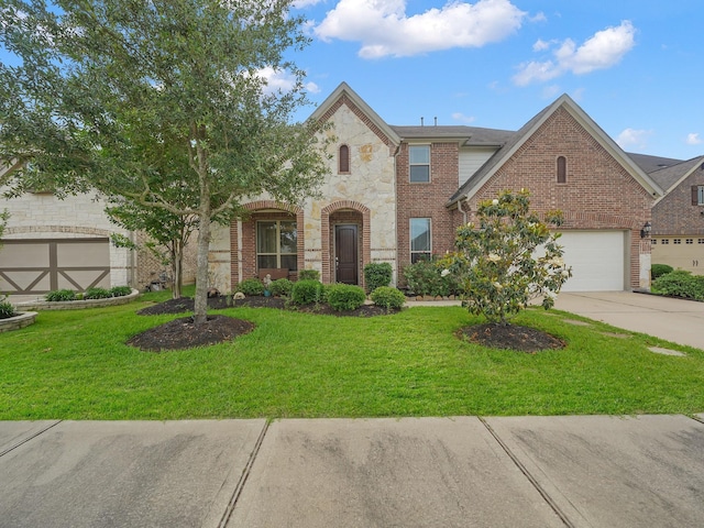 view of front of property featuring driveway, brick siding, and a front lawn