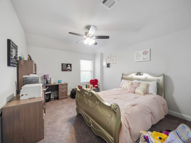 bedroom featuring a ceiling fan, visible vents, and light colored carpet