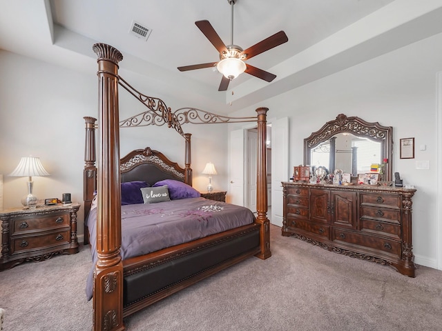 bedroom featuring ceiling fan, carpet flooring, and visible vents