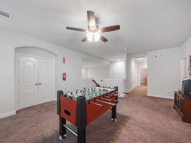 game room with visible vents, baseboards, ceiling fan, and carpet floors
