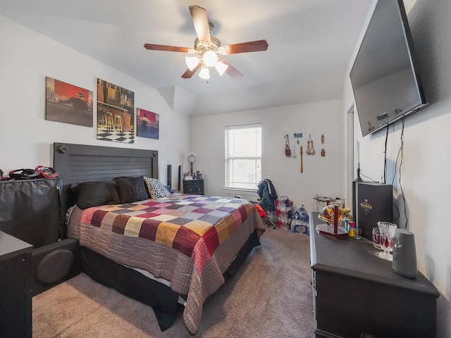 bedroom featuring ceiling fan and carpet