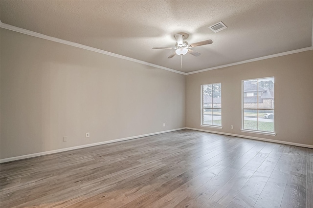 4218 Bayglen Ct, Houston, TX 77068 - unfurnished room with wood finished floors, a textured ceiling, visible vents, ceiling fan, and baseboards