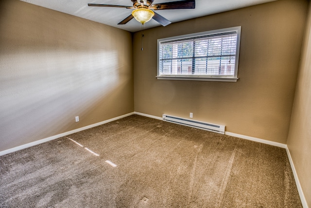 401 E Main St, Brenham, TX 77833 - carpeted empty room with a baseboard heating unit, ceiling fan, and baseboards
