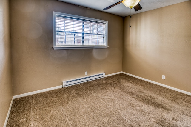 401 E Main St, Brenham, TX 77833 - carpeted spare room featuring a baseboard radiator, ceiling fan, and baseboards
