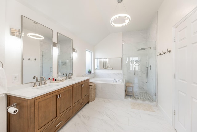 bathroom featuring a marble finish shower, a garden tub, a sink, and vaulted ceiling