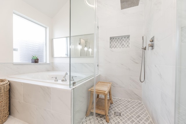 full bath featuring a bath, tile patterned flooring, and a stall shower