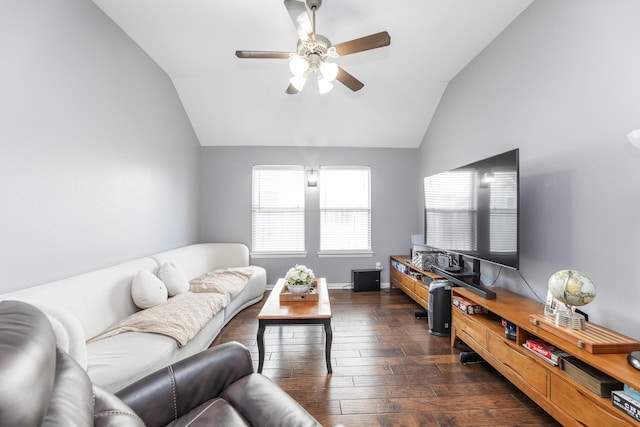 living room with dark wood-style floors, lofted ceiling, and a ceiling fan
