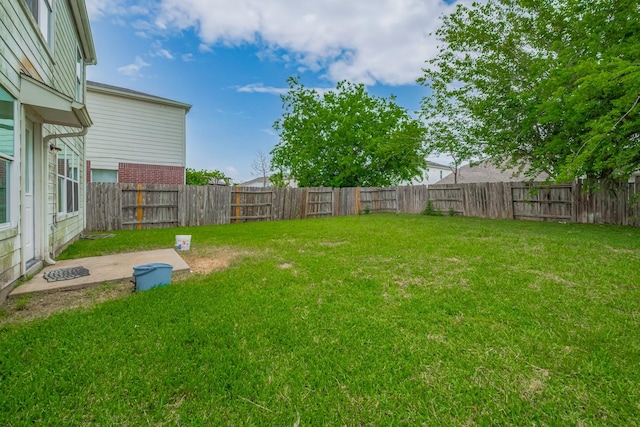 14910 Sugar Crystal Ct, Sugar Land, TX 77498 - view of yard with a fenced backyard and a patio