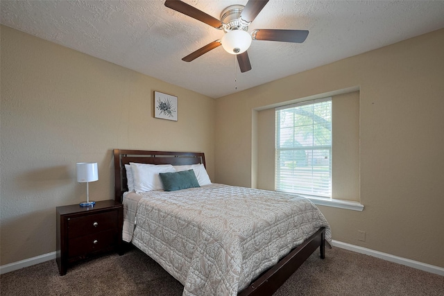 bedroom with baseboards, ceiling fan, and carpet floors