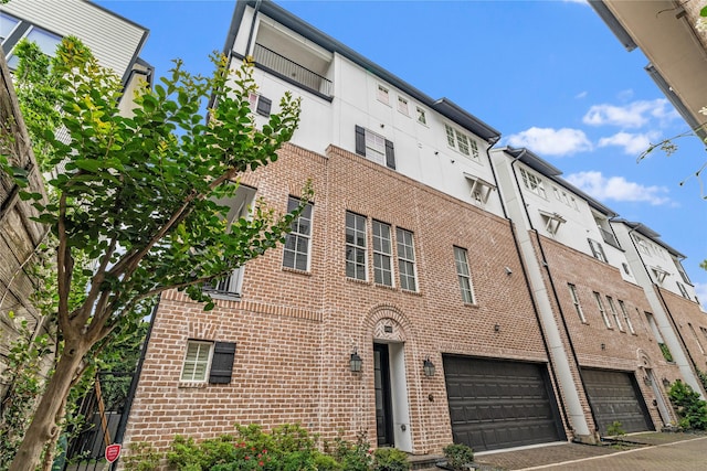 view of building exterior with an attached garage