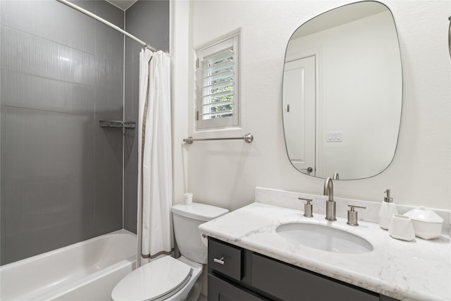 full bathroom with vanity, toilet, and shower / tub combo