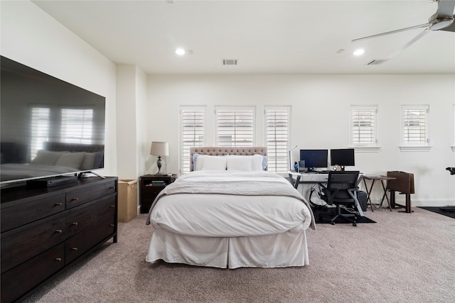 bedroom with a ceiling fan, recessed lighting, visible vents, and light colored carpet