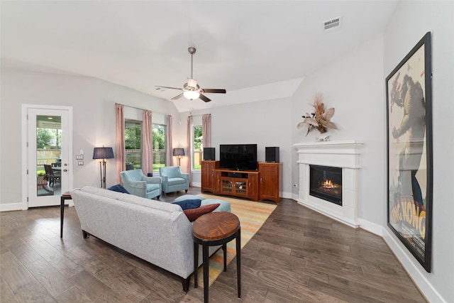 145 Lily Green Ct, Conroe, TX 77304 - living room with wood finished floors, plenty of natural light, ceiling fan, and baseboards