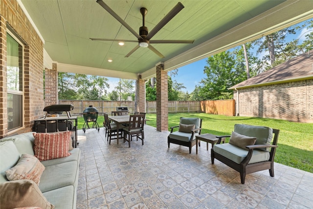 145 Lily Green Ct, Conroe, TX 77304 - view of patio / terrace with outdoor lounge area, outdoor dining area, ceiling fan, and grilling area