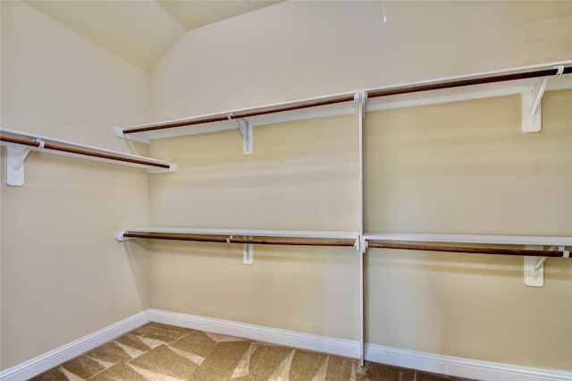 8523 Dolan Heights Ct, Cypress, TX 77433 - spacious closet featuring carpet and vaulted ceiling