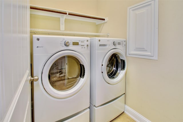 8523 Dolan Heights Ct, Cypress, TX 77433 - clothes washing area featuring laundry area and washing machine and clothes dryer