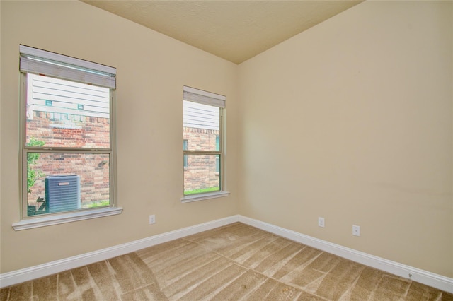 8523 Dolan Heights Ct, Cypress, TX 77433 - empty room with baseboards and light carpet