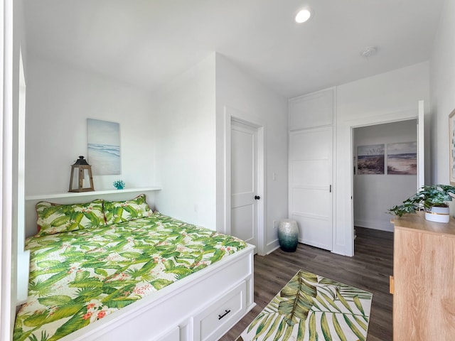 525 Annabelle Dr, Gilchrist, TX 77617 - bedroom with dark wood-style flooring and recessed lighting