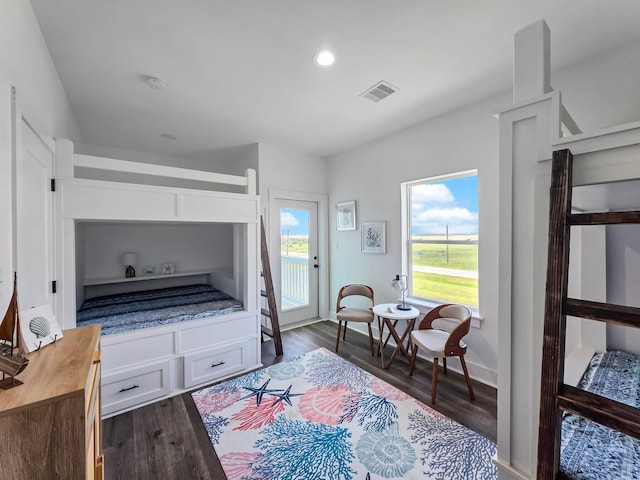 525 Annabelle Dr, Gilchrist, TX 77617 - bedroom with visible vents, access to outside, dark wood-type flooring, and recessed lighting