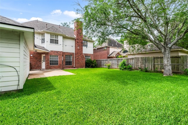 6615 Cypress Village Dr, Sugar Land, TX 77479 - view of yard featuring a patio and a fenced backyard