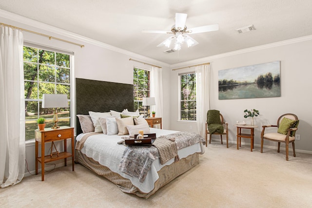 6811 S Trace Dr, Magnolia, TX 77354 - bedroom featuring light colored carpet, ornamental molding, visible vents, and multiple windows